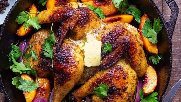 Image of Spatchcocked Mama Manje Roast Chicken with Peaches & Herbs