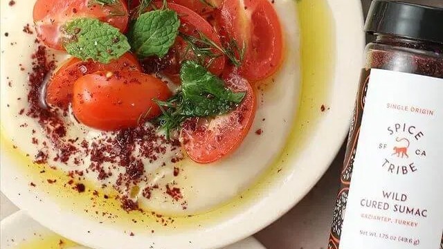 Image of Tahini Tomato Sumac Salad