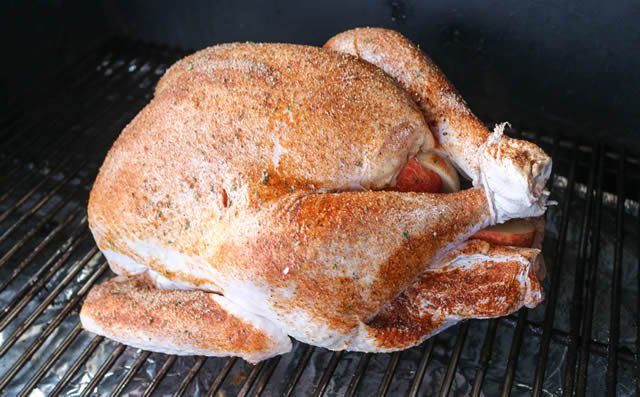 Image of Season the outside of the turkey with Cajun seasoning* and...