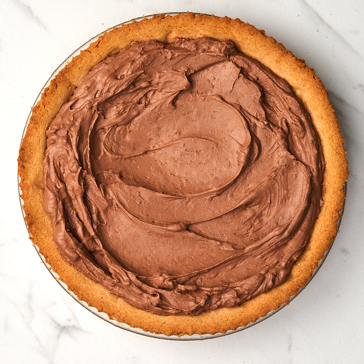 Image of Pour into the cooked pie crust and return to the fridge for a few hours until set.  