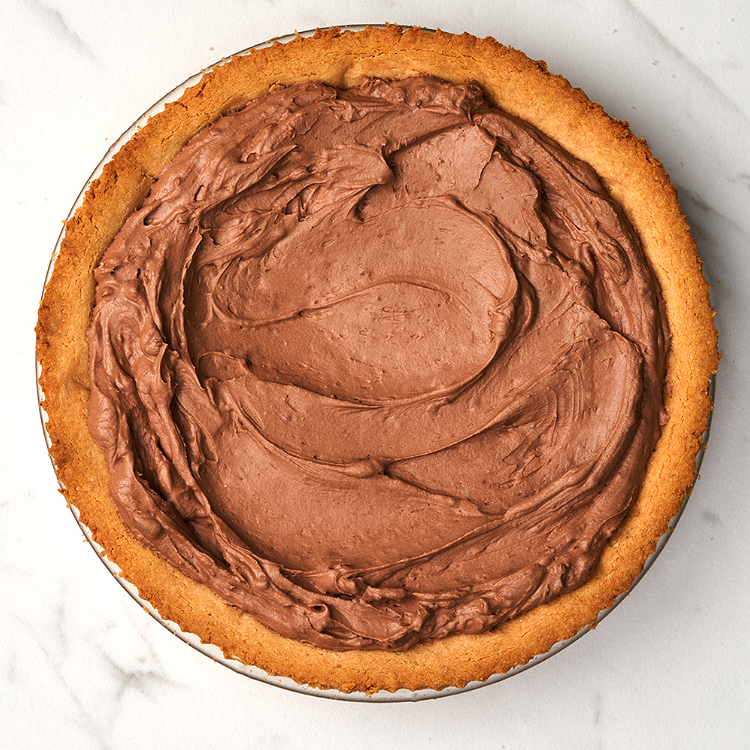 Image of Pour into the cooked pie crust and return to the...