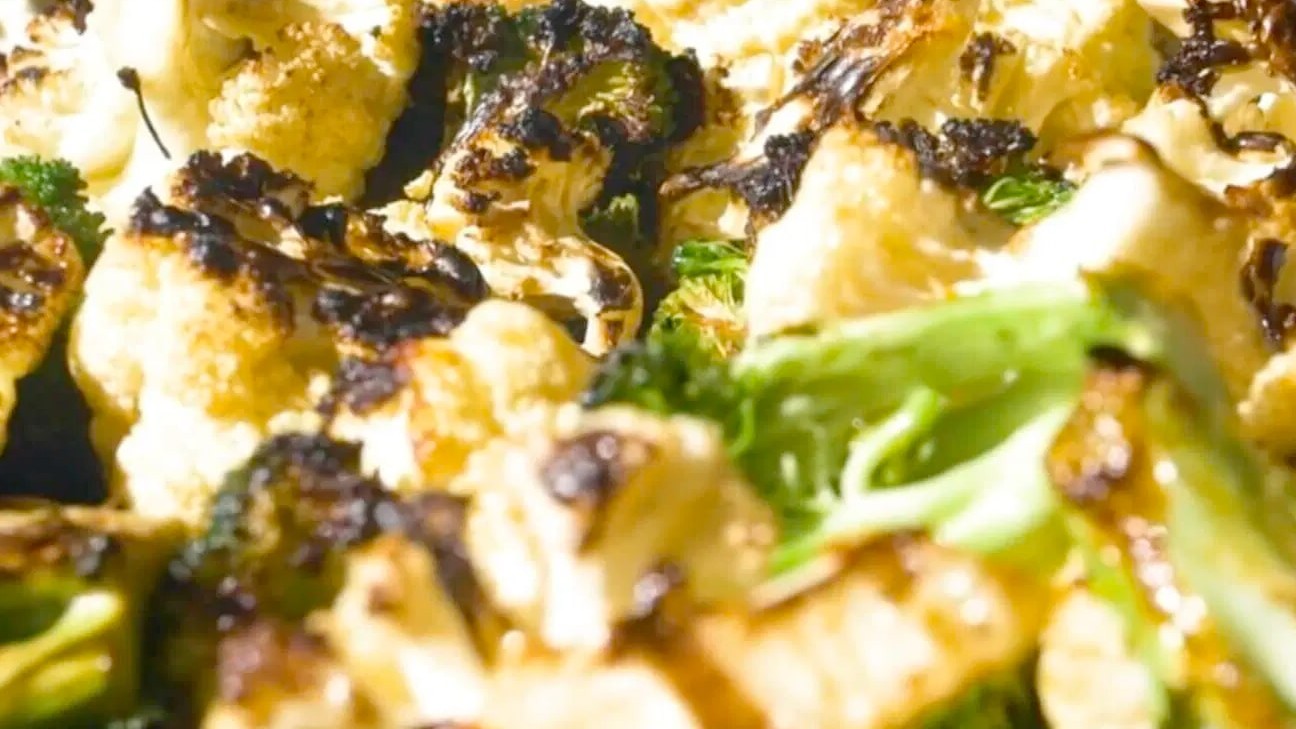 Image of Grilled Broccoli and Cauliflower with Spicy Peanut Vinaigrette