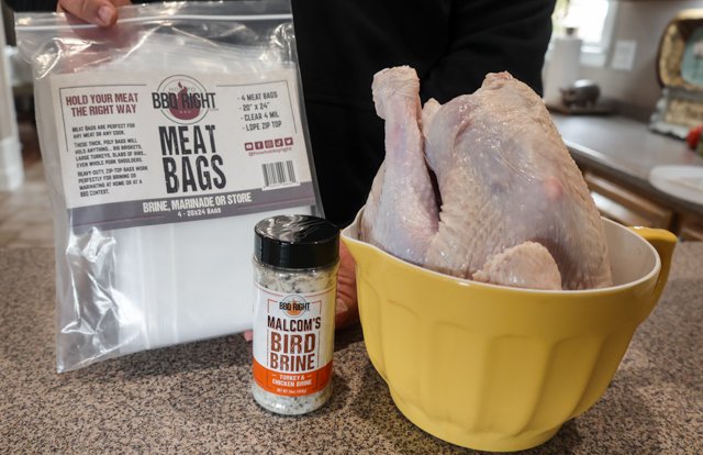 Image of Place the turkey in Meat Bag or large container and...