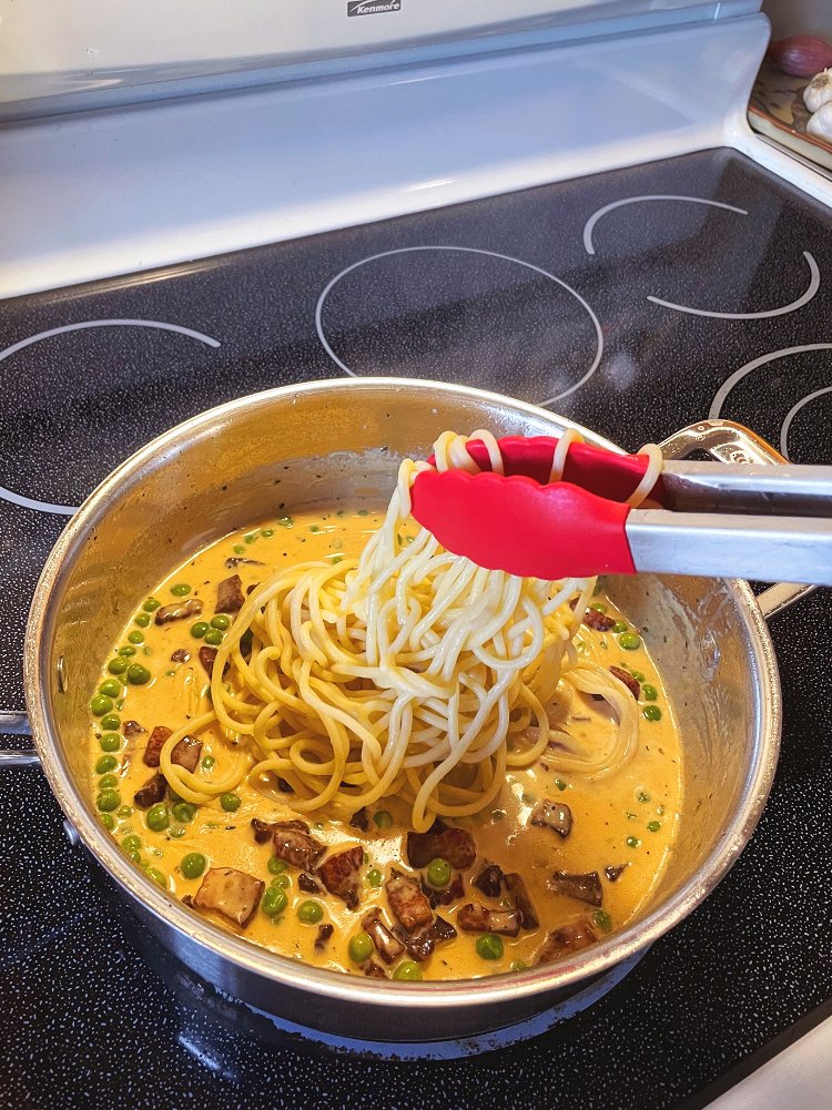 Image of Drain your pasta, then transfer to your sauce.