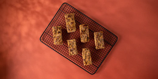 Image of After baking sprinkle some sea salt on top of pecan bars. Cool, cut into squares, and enjoy