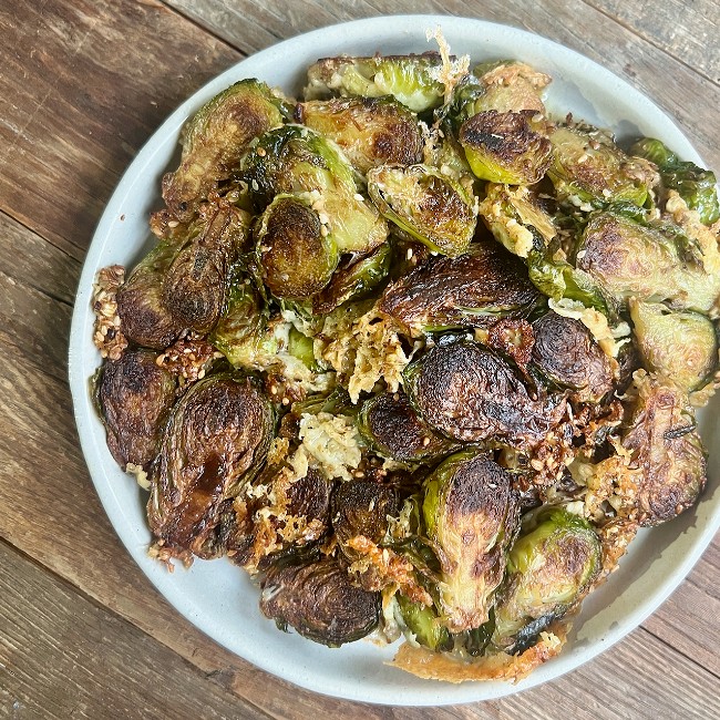 Image of Crispy Caramelized Brussels Sprouts with Manchego Cheese