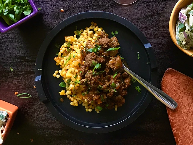 Image of North African Meat Sauce with Saffron Couscous