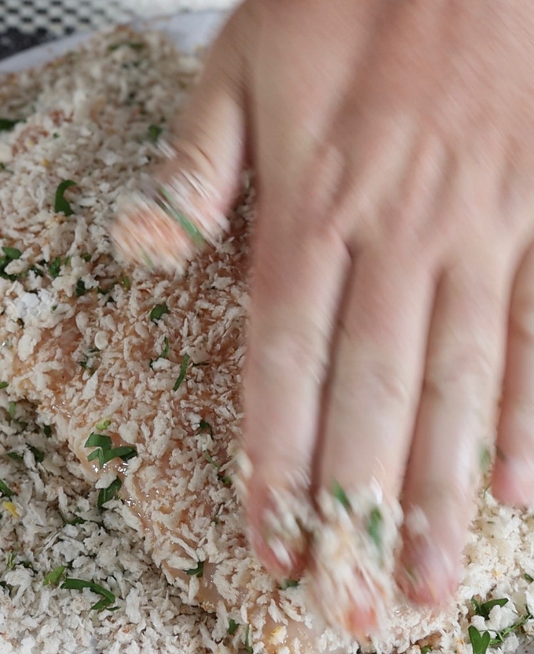 Image of Dip chicken into flour, egg the panko mix. Be sure to press the crumbs into the chicken firmly.