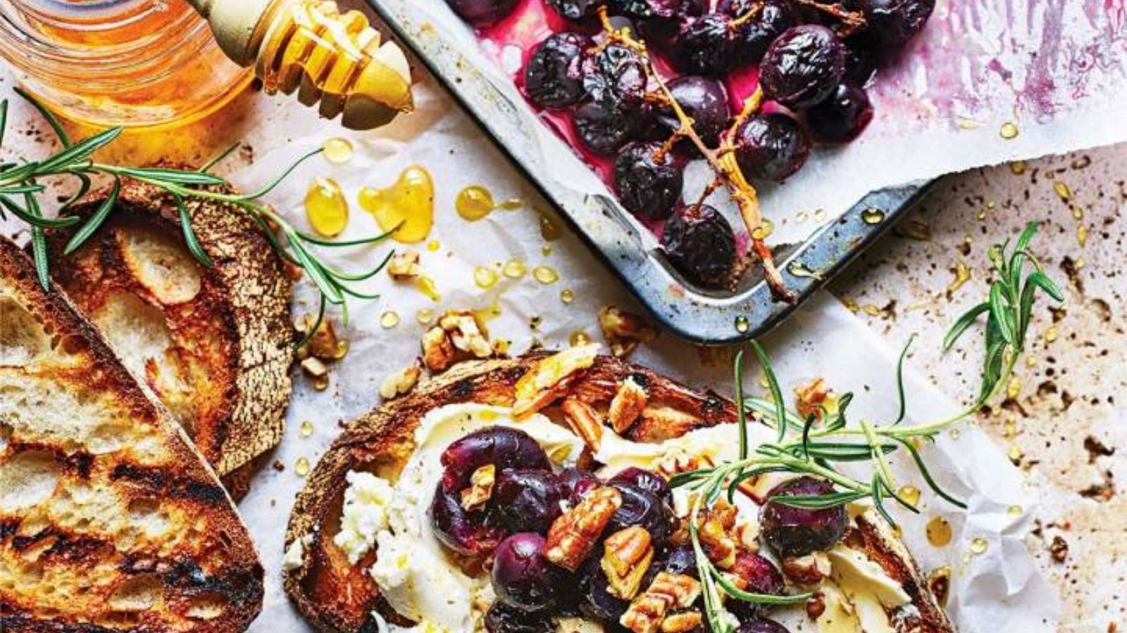 Image of Honey-roasted grape and goats’ cheese toasts