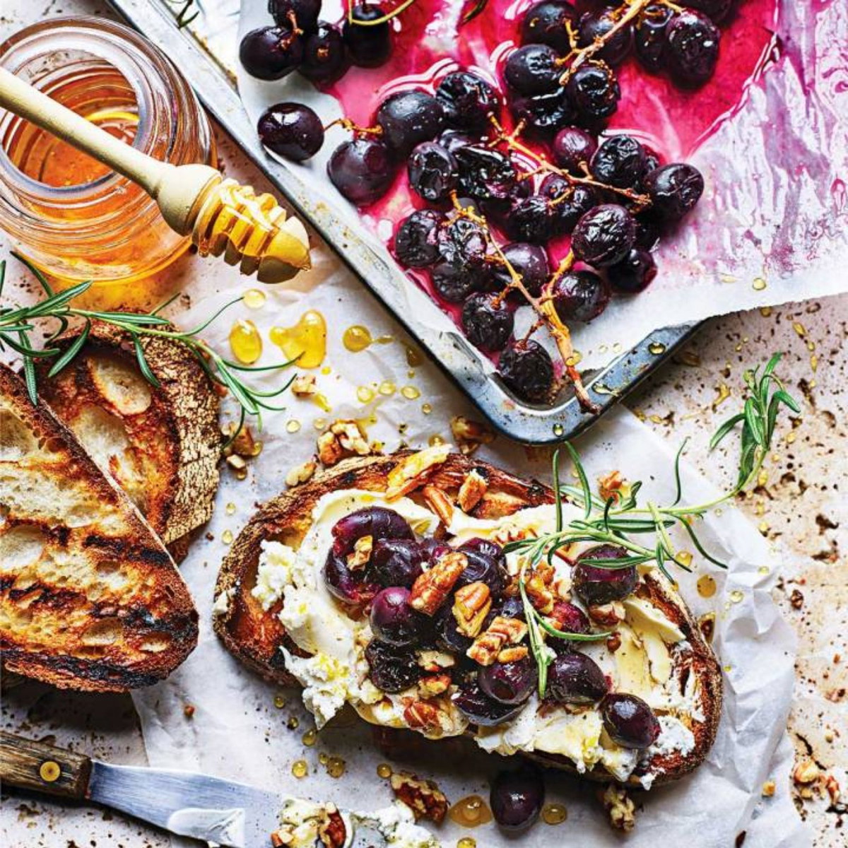 Honey-roasted grape and goats’ cheese toasts