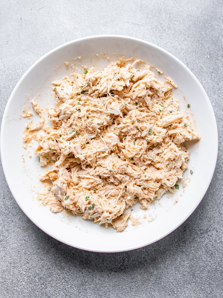Image of In a medium mixing bowl, stir together crabmeat, egg, mayonnaise,...