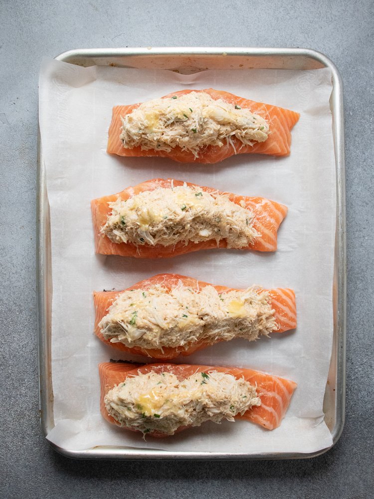 Image of Stuff each salmon portion with filling and use hands to...