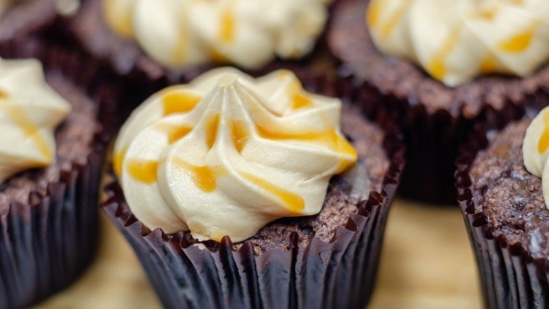 Image of Apple Cider Cupcakes With Frosting And Caramel Drizzle