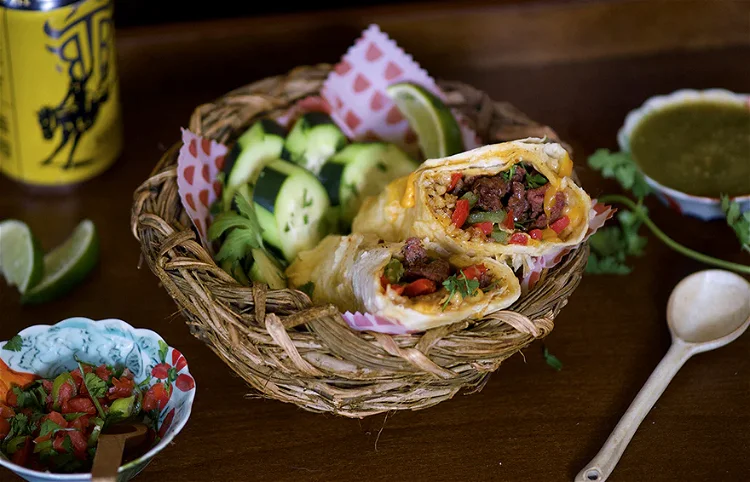 Image of A whole meal wrapped up in a tortilla. If you're...