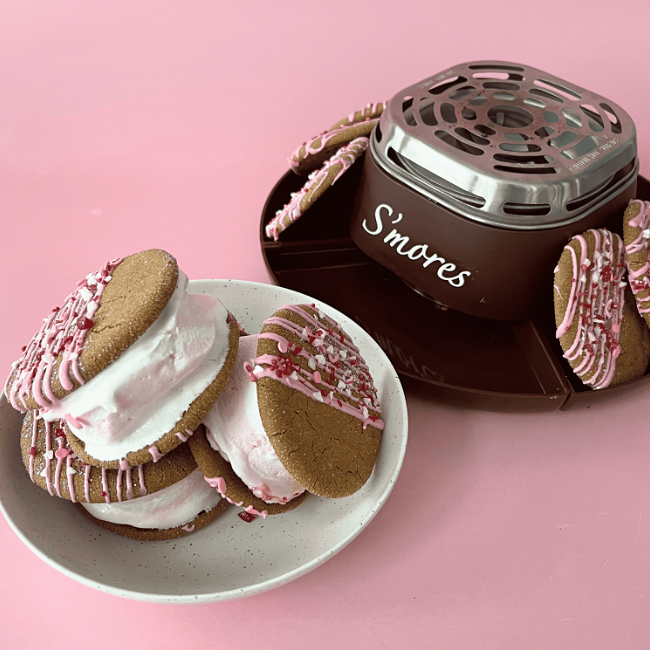 Image of GINGER CRINKLE CANDY CANE S’MORES COOKIE SANDWICHES