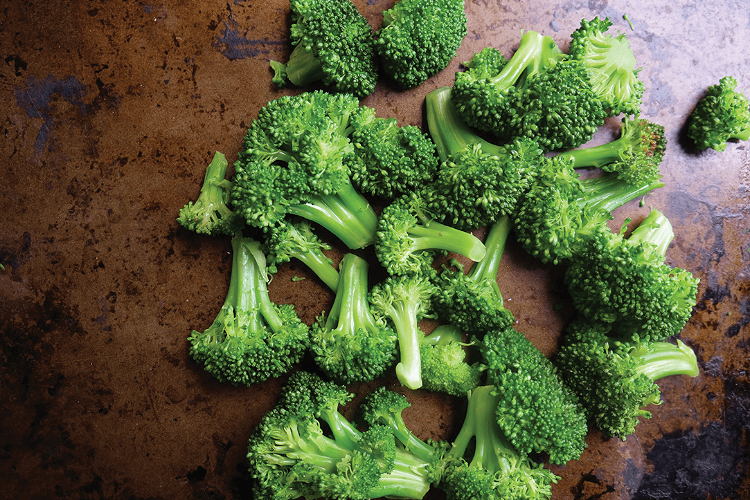 Image of Cut the broccoli crown into florets. Place the broccoli florets in...