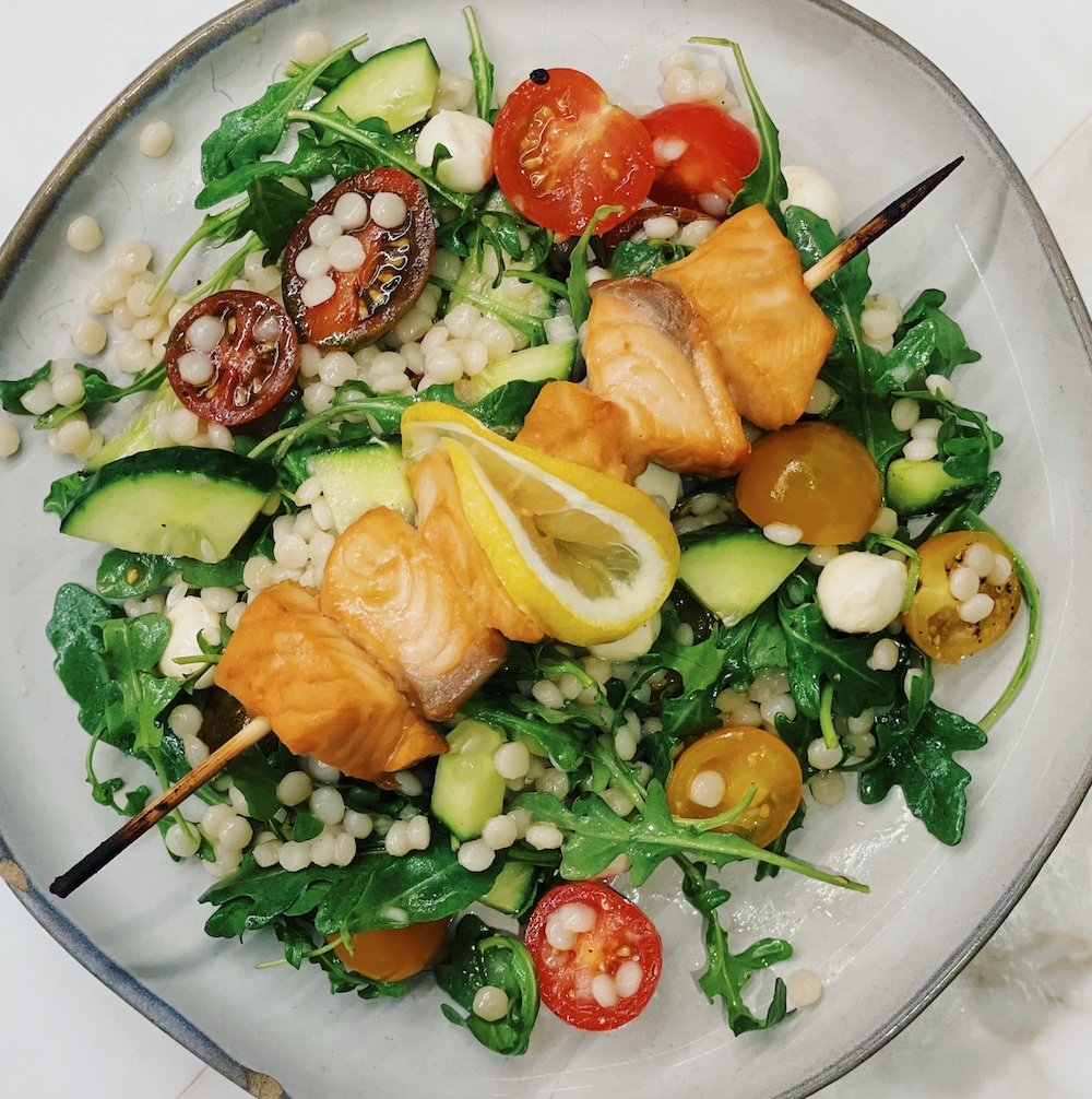 Image of Salmon Skewer over Mediterranean Couscous Salad