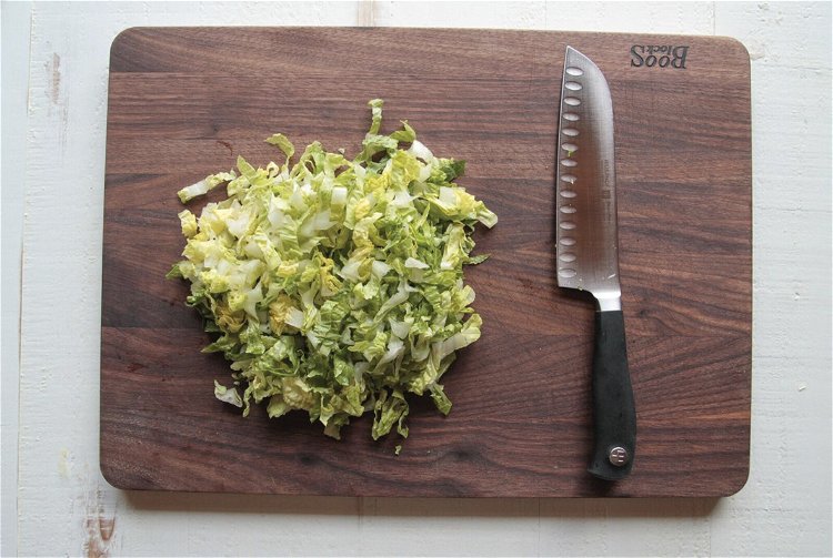 Image of While the meat is cooking, cut the lettuce into thin strips...