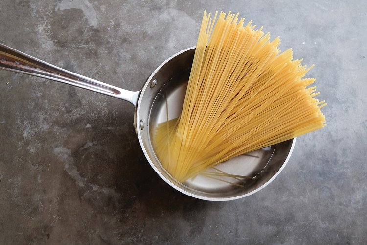 Image of Lightly coat the bottom of a large sauté pan with...