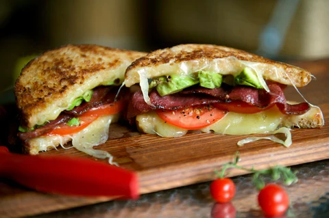 Image of Grilled Bacon, Tomato, Avocado and Cheese Sandwich