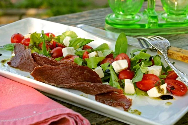 Image of Buffalo Bacon Caprese Salad with Sweet Basil Vinaigrette 