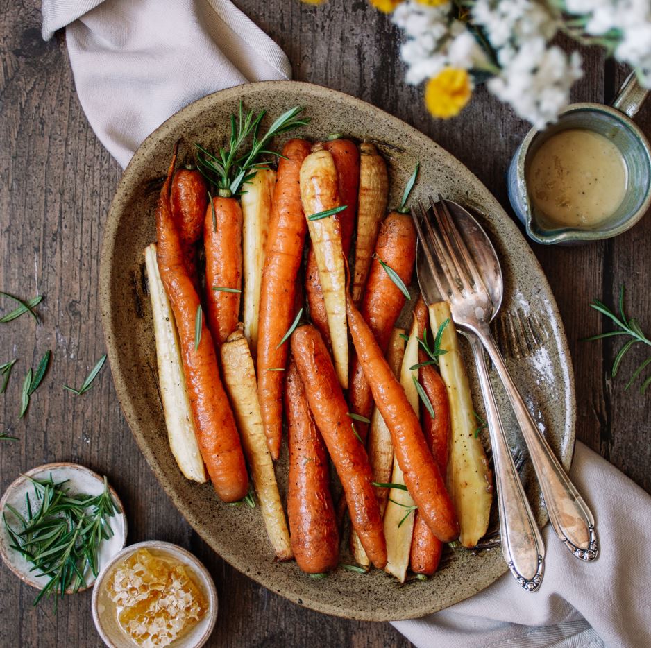 Honey roasted carrots & parsnips with garlic tahini drizzle