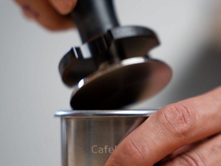 Image of Tamp evenly. The Cafelat tamper works well to make sure...