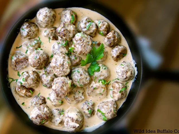 https://images.getrecipekit.com/20221202110508-swedish_meatballs_w_cilantro_rswm.webp?aspect_ratio=4:3&quality=90&