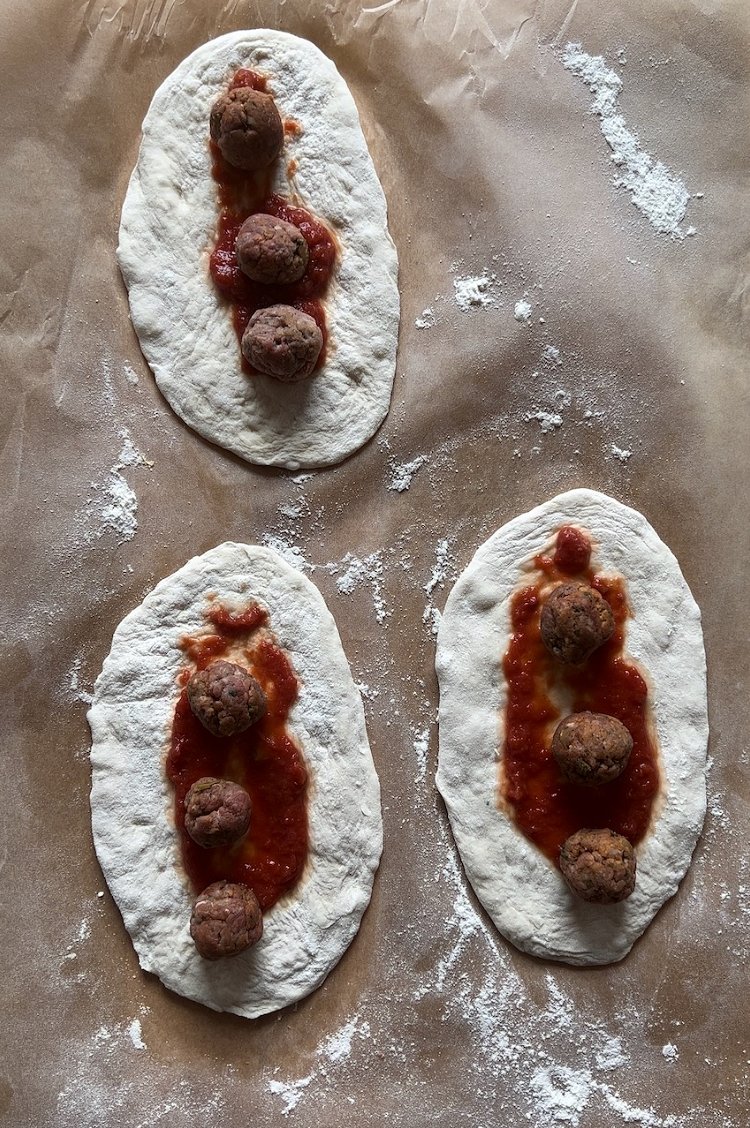 Image of Place cheese and meatballs in the center of the dough....