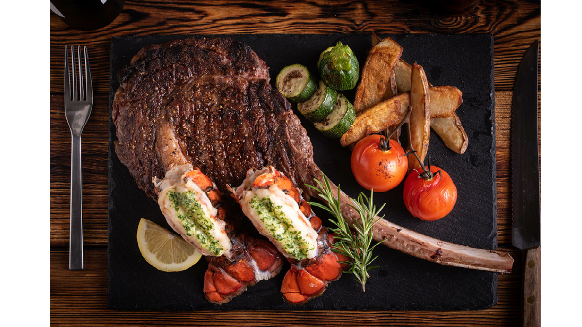 Ultimate Surf & Turf: Tomahawk Ribeye Steak & Lobster