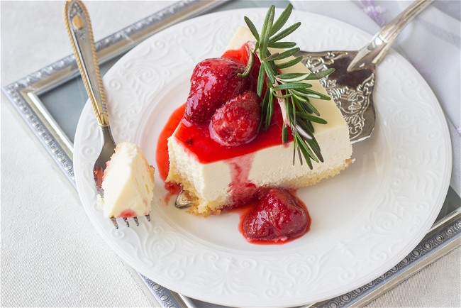 Image of Cheesecake With Strawberry Sauce