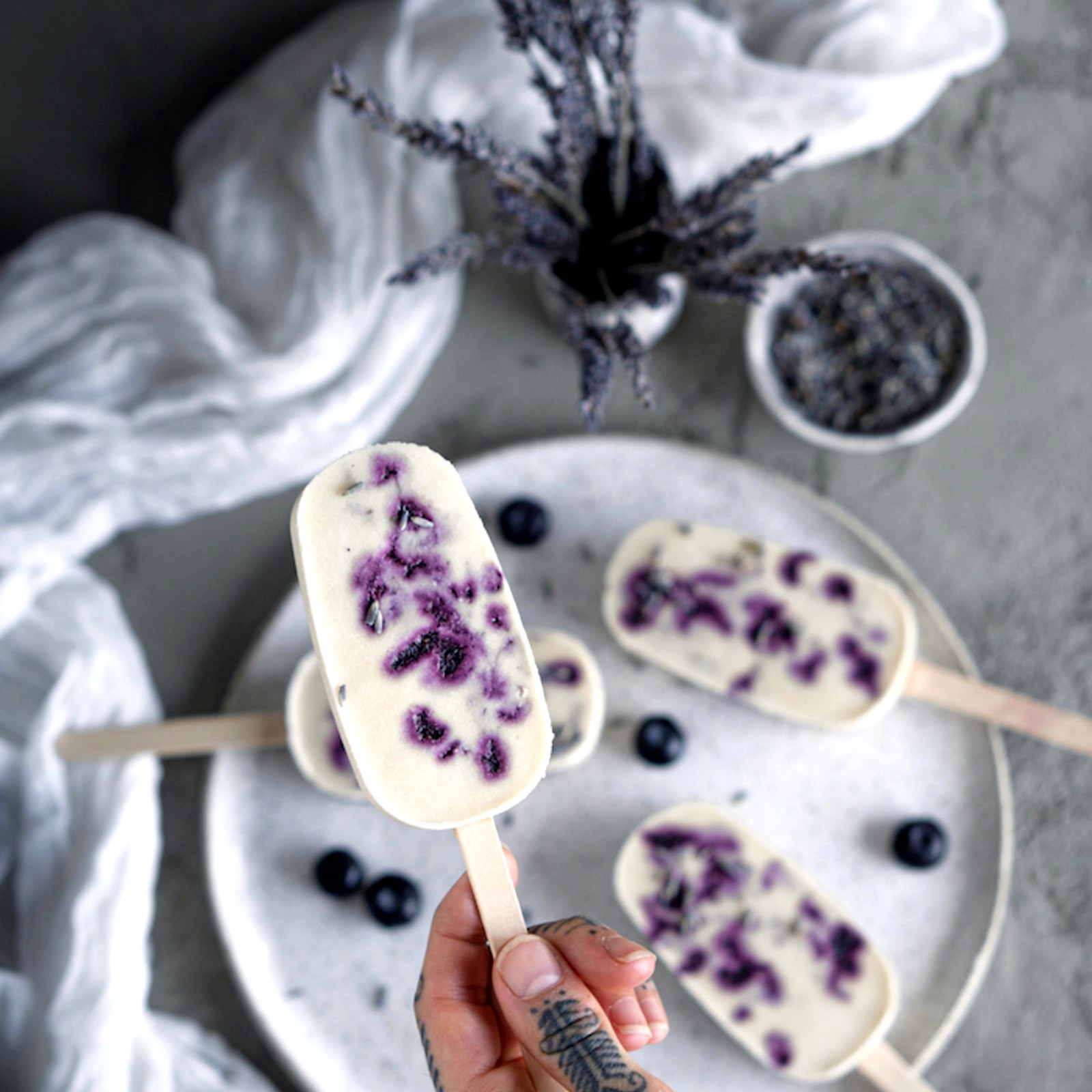 https://images.getrecipekit.com/20221220134255-lavender-popsicles-1-levo_2_iskasm.jpg?aspect_ratio=1:1&quality=90&auto_optimize=medium