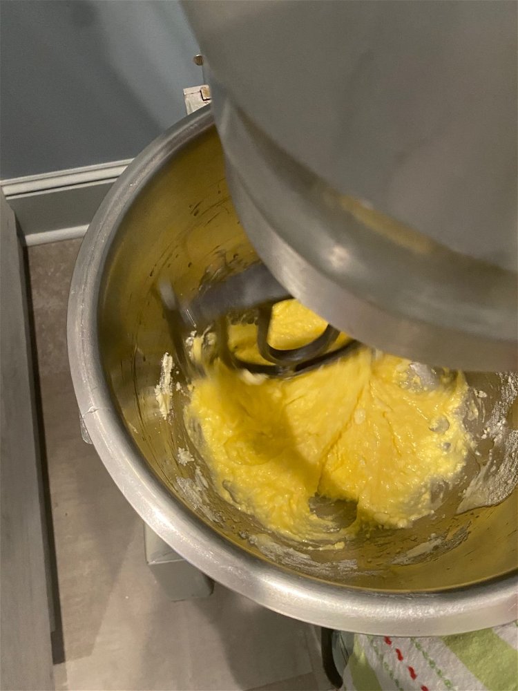 Image of In a mixer with a paddle attachment, cream butter and...