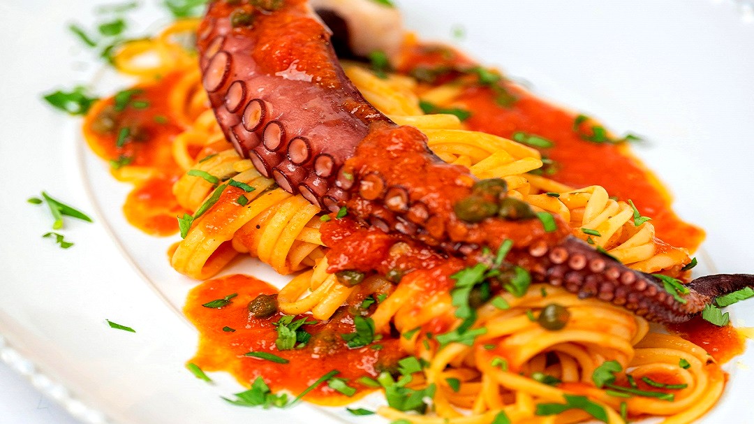 Image of Octopus Leg with Peeled Tomato Linguine