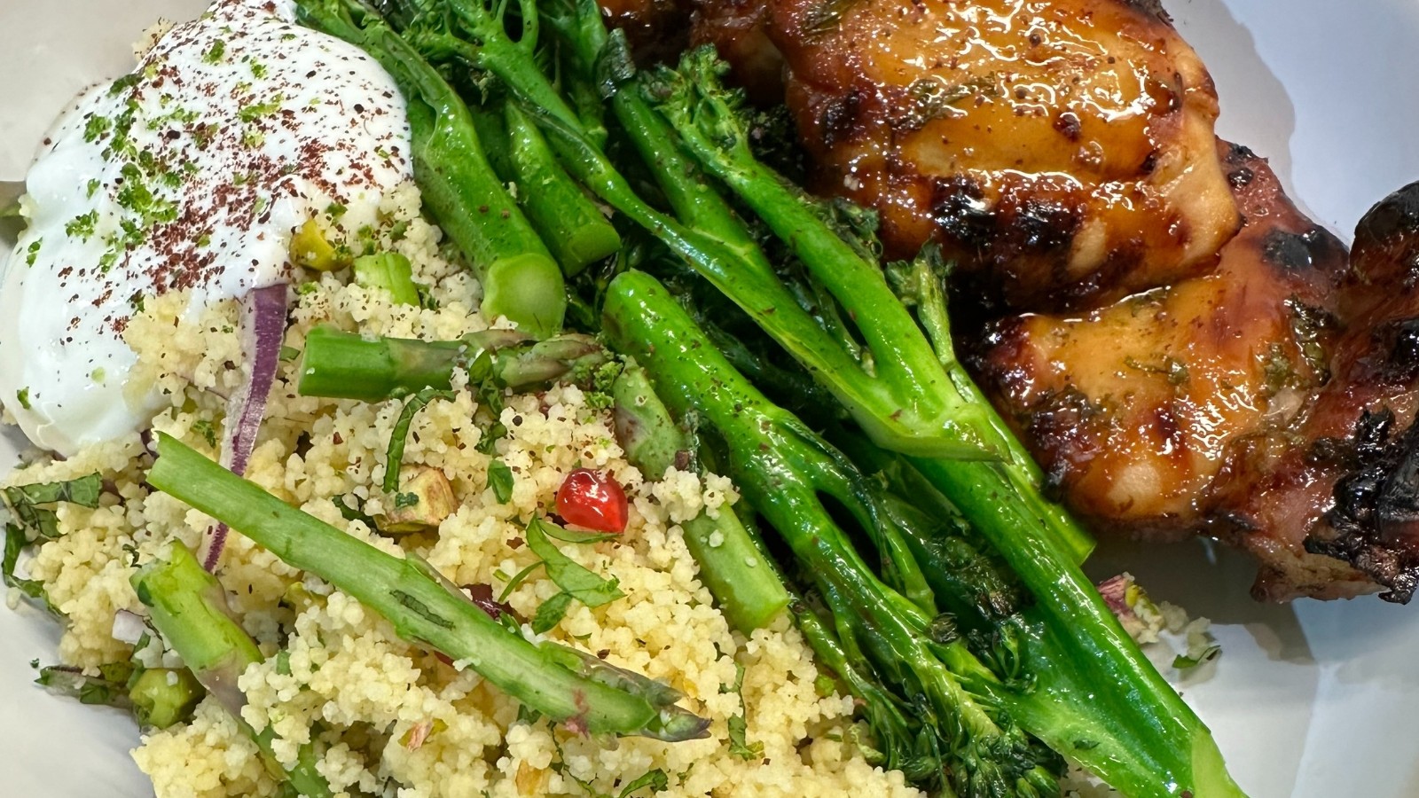 Image of Sticky honey-lime chicken with herby, pistachio couscous