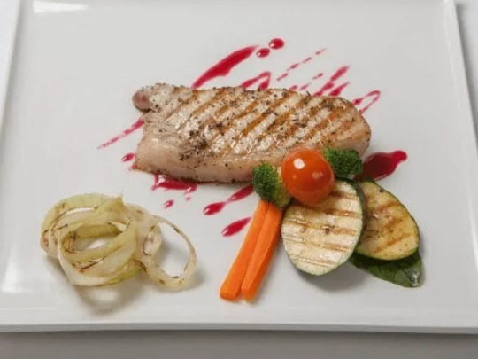 Image of Grilled Boneless Pork Chops with Cranberry-Lemon Thyme Chutney