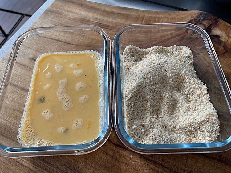 Image of Have your bread crumbs and seasoning in one dish and beaten eggs, with milk in another