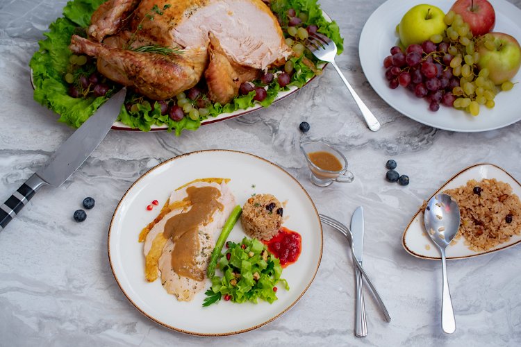 Image of Present your roasted turkey on a decorative platter and garnish...