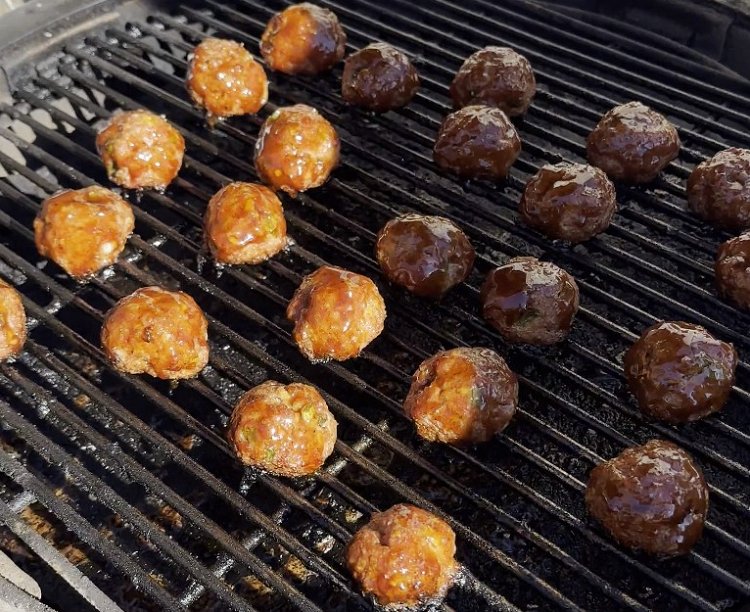Image of Brush glaze mixture over meatballs and cook for 5-10 minutes...