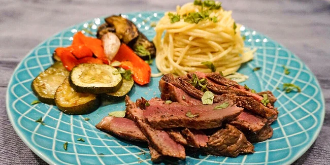 Image of Rump Steak Stacks with Spaghetti Nests and Roasted Veggies