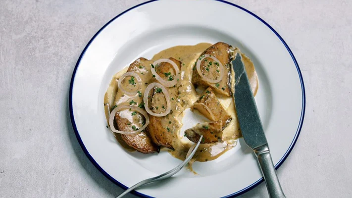 Image of Swede ‘Steak’, Butterbean Mash, Pickled Shallots, Peppercorn Sauce