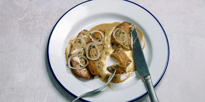 Swede ‘Steak’, Butterbean Mash, Pickled Shallots, Peppercorn Sauce
