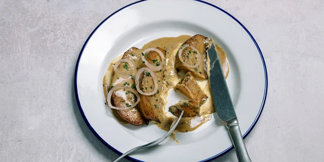 Image of Swede ‘Steak’, Butterbean Mash, Pickled Shallots, Peppercorn Sauce