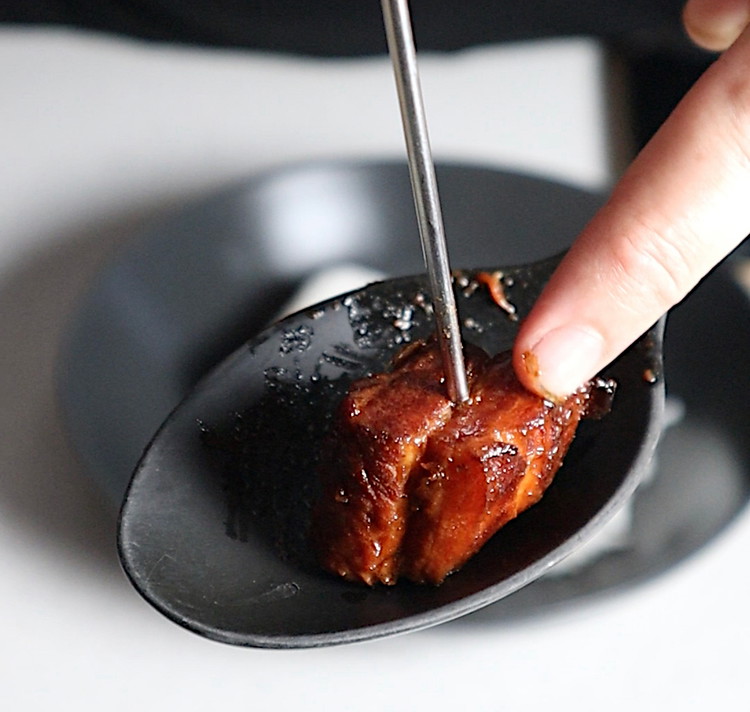 Image of Simmer with lid on until pork is tender. You should be able to push a skewer through the pork with little resistance 