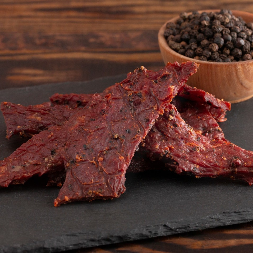 https://images.getrecipekit.com/20230118210624-venison-jerky-recipe.jpg?aspect_ratio=1:1&quality=90&