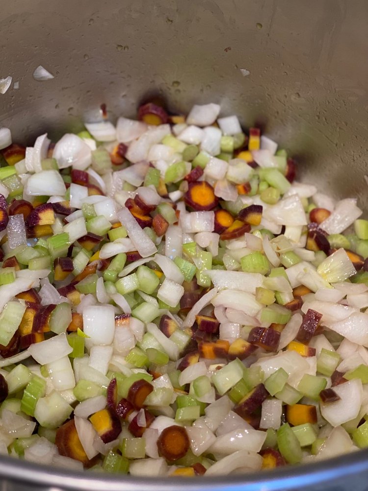 Image of Add the onions, celery and carrots. Stir to coat and...