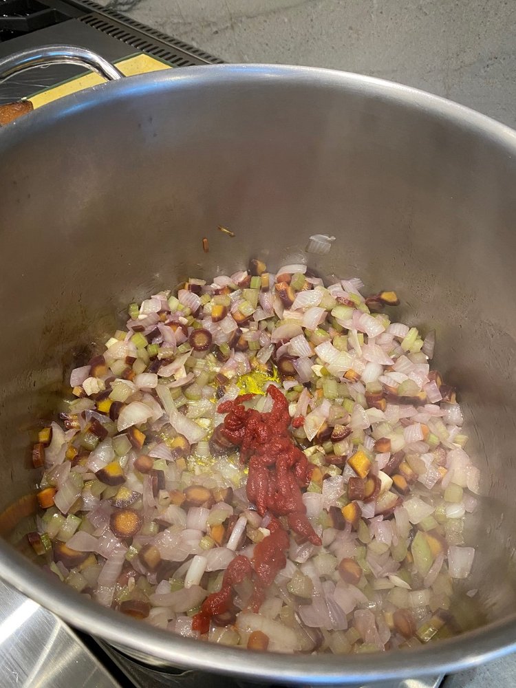 Image of Add the tomato paste, chopped chipotle peppers, cumin and salt...