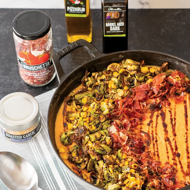 Image of Creamy Polenta With Crispy Pancetta, Brussel Sprouts, And Corn