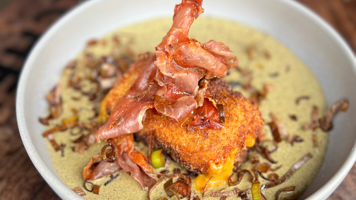 Image of Smoked Broccoli Soup with Crispy Fried Panko Cheddar, Prosciutto and Leeks