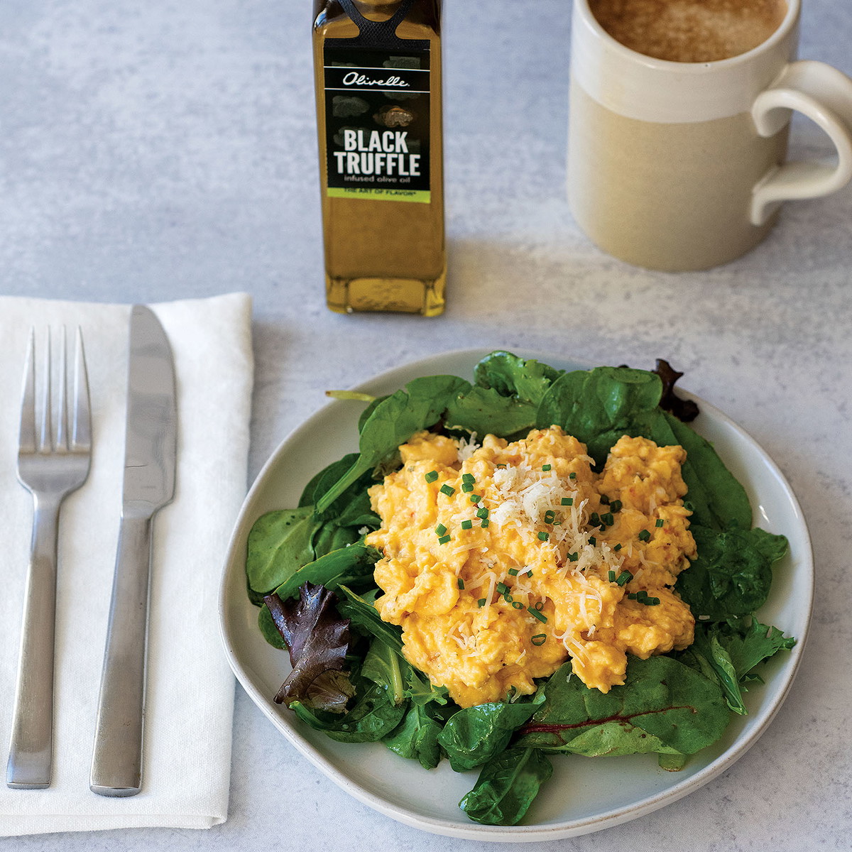 Creamy Parmesan Eggs With Truffled Greens